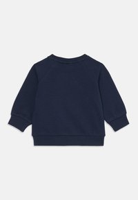 Mörkblå sweatshirt med långa ärmar, ribbade cuffs och nederkant, tillverkad av mjukt tyg, med rund hals och raglanärmar.