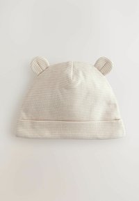 Bonnet pour bébé rayé crème avec des oreilles arrondies, en coton doux, avec un revers replié et une texture lisse.