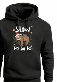 Black hoodie featuring a graphic of a sloth, festive lights, and text "Slow ho ho ho!" with a Santa hat and surrounding stars.