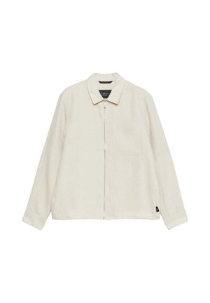 Beige Langarmjacke mit Reißverschluss vorne, Kragen, einer Brusttasche und kleinem schwarzem Label am Saum auf weißem Hintergrund.