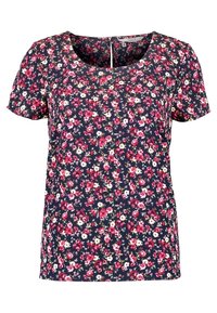Mörkblå blus med kort ärm, prydd med små blommönster i rosa, röd och vit, samt rund halsringning.