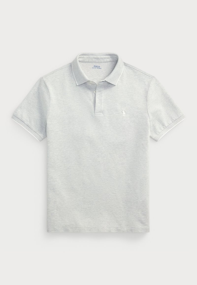 Helehall polo-särk on valmistatud tekstuurilisest puuvillast, millel on klassikaline krae, lühikesed varrukad ja väike tikitud logo vasakul rinnal.