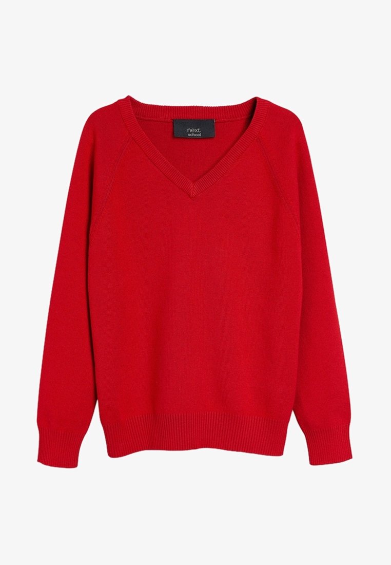 Pull rouge à manches longues col en V, avec poignets et ourlet côtelés, étiqueté "next school" à l'intérieur du col.