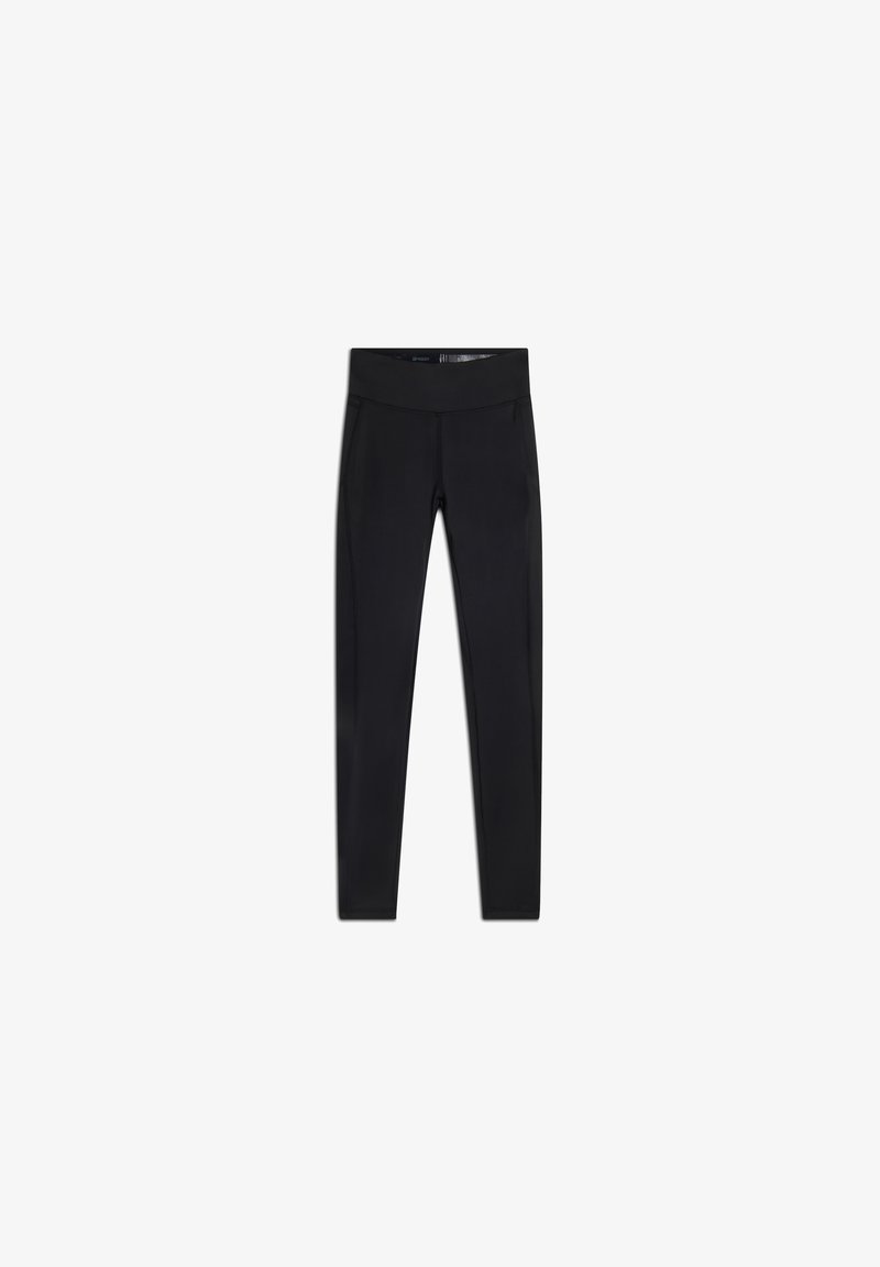 Leggings neri realizzati in un tessuto elasticizzato, con un'alta vita, vestibilità aderente e texture liscia senza motivi o decorazioni.