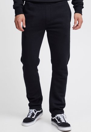 PRAVNES REGULAR FIT - Spodnji deli trenirk - black