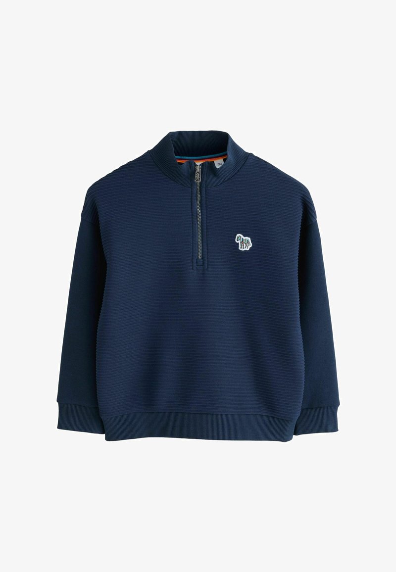 Tumši zils ribots garām piedurknēm pulovers ar pus-izjaukšanas rāvējslēdzēju un mazu krāsainu suņu logotipu uz kreisā krūšu kabatas.