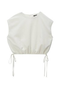 Top blanc court avec un col rond, des manches courtes et des liens de serrage à l'ourlet, fabriqué en tissu léger au toucher doux.