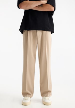 Pantaloni - beige