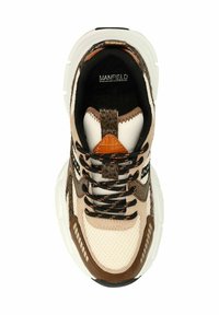 Sneaker with a mesh upper in cream, brown suede accents, and dark laces. Features a chunky white sole and triangular orange detail on the tongue.