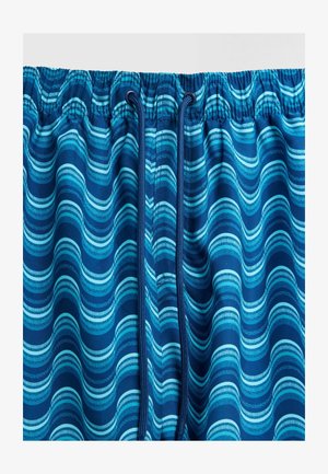 Modré šortky s vzorem, elastickým pasem a šňůrkou na stažení. Ozdobené vlnitými liniemi v různých odstínech modré a bílé barvy, s hladkým povrchem.