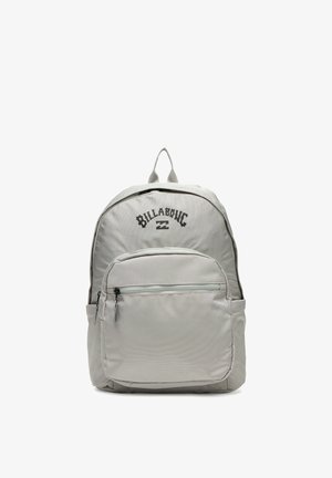 Light gray Billabong backpack with a front zippered pocket, top handle, and logo printed above the main compartment zipper.