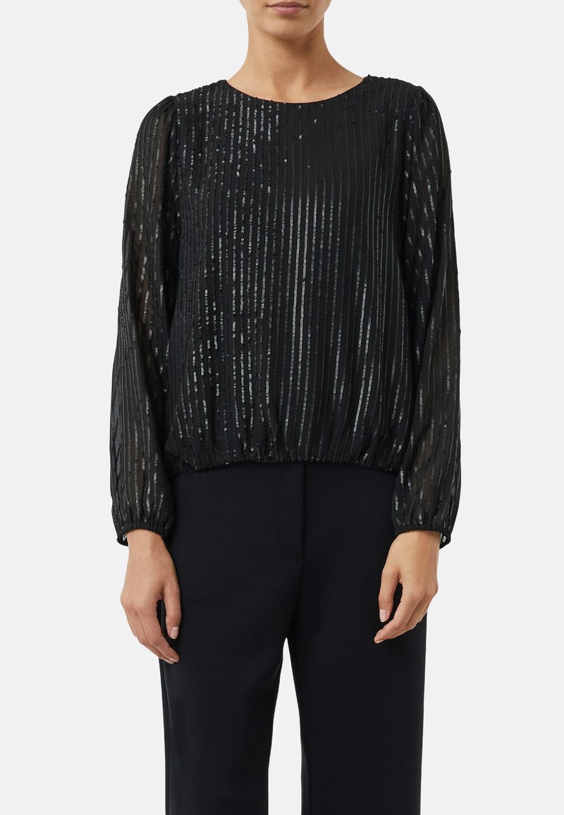 Schwarze Langarmbluse mit strukturierten Streifen und metallischen Akzenten. Der Schnitt ist locker mit einem gerafften Saum und Bündchen. Leichter, transparenter Stoff.