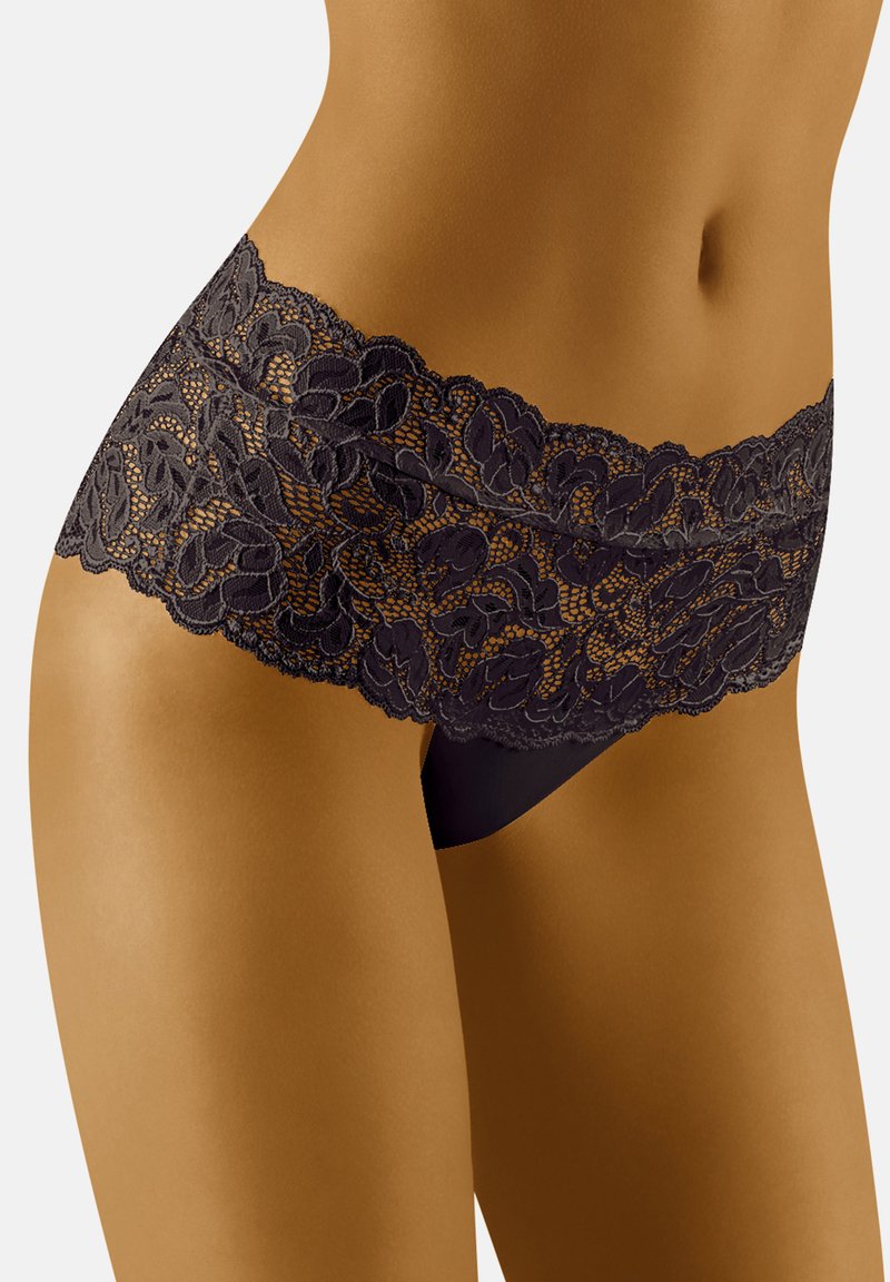Panty hipster in pizzo nero con motivo floreale, una fascia morbida in vita e una texture liscia. Il design enfatizza comfort e stile.