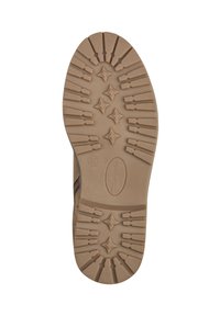 Semelle de chaussure marron avec surface en caoutchouc texturé. Caractéristiques de motifs en forme d'étoile et de crêtes pour l'adhérence. Taille indiquée comme 37.