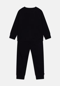 Tommy Hilfiger BABY MONOTYPE OVAL UNISEX SET - Tracksuit - desert sky