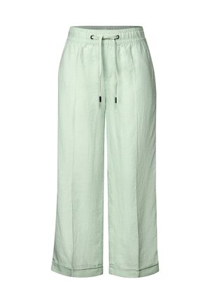 Pantaloni in lino verde chiaro con vestibilità rilassata, vita elastica, coulisse regolabile e gamba larga. La texture appare leggermente stropicciata.