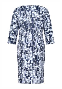 Robe longueur genoux avec manches trois-quarts présentant un motif abstrait géométrique en chaînette bleu marine et blanc.
