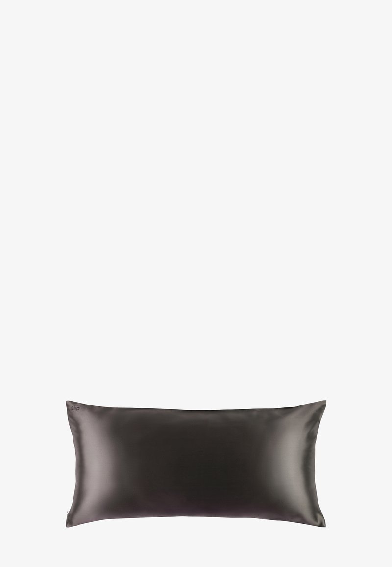 Rectangular black satin pillow with a smooth texture and subtle sheen, featuring a discreet logo on one edge.