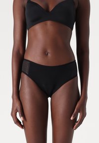 Schiesser Menstruationsundertøj - schwarz