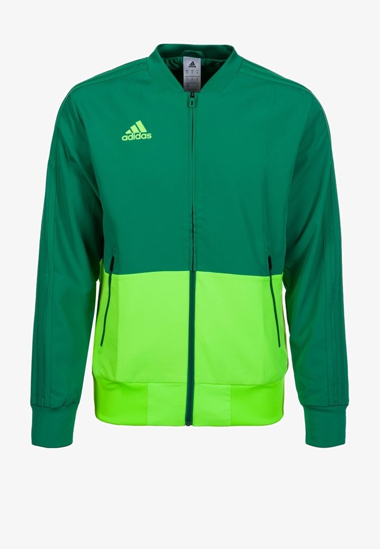 Zelená a neonově zelená bunda Adidas se zipem vpředu, bočními kapsami, žebrovanými manžetami a třemi pruhy na rukávech.