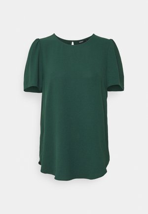 Donkergroene blouse met korte mouwen, met opgeblazen schouders, ronde halslijn en een losse pasvorm.