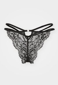 String noir en dentelle avec un motif floral, présentant des fines lanières, un petit charme en forme de cœur à l'avant, et une coupe triangulaire à l'arrière.