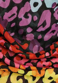Multicolored fabric with a black base, featuring large, abstract splotches in pink, red, and orange, with a soft, textured appearance.