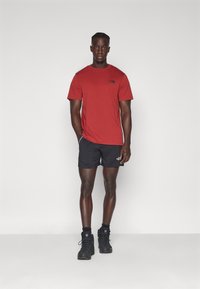The North Face HAKUUN SHORT - Kurze Sporthose - black