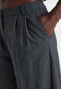 Vero Moda VMMADJA WIDE PANT - Hlače - dark grey melange