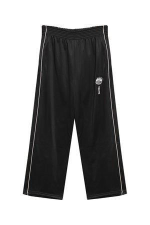 Pantaloni sportivi neri con vestibilità ampia, elastico in vita e strisce bianche sui lati. Presenta un logo a fiamma sulla parte inferiore della gamba.