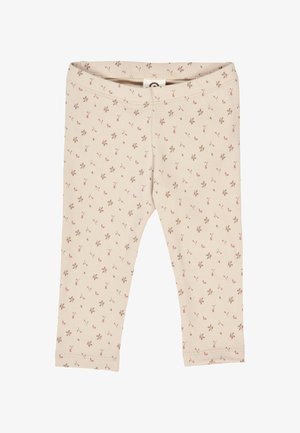 Beige legging with light floral pattern in pink and brown. Soft cotton material with an elastic waistband. Ankle-length and fitted design.