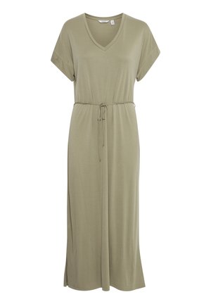Olivno zelena obleka z V-izrezom, kratkimi rokavi in pasom s pentljo v pasu. Ima stranske razpoke in sproščen silhueto. Tkanina iz mešanice bombaža.