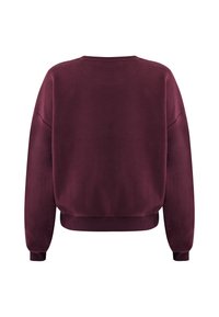 Felpa bordeaux con collo a giro e spalle scese, con polsini e orlo a costine. Texture morbida e design semplice senza motivi o dettagli visibili.