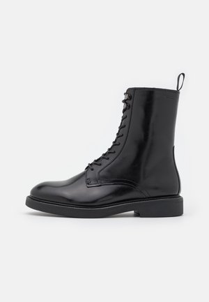 Šněrovací kotníkové boty - black