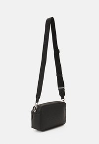 Calvin Klein MUST CAMERA BAG MONO - Olkalaukku - black mono