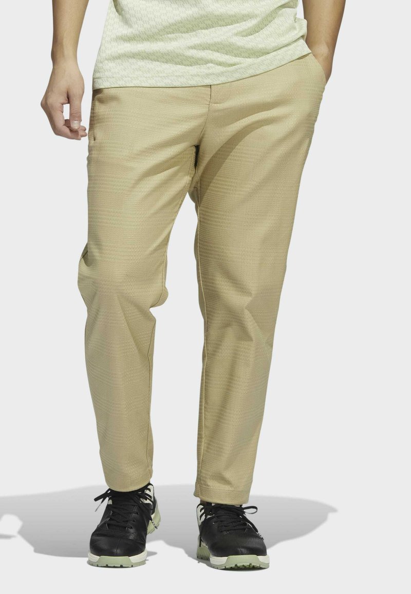 adidas Golf ADICROSS FUTURA Trousers beige Zalando.de