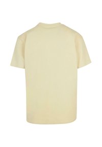 Merchcode FAITH - T-shirts print - softyellow