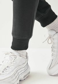 Next JOGGERS REGULAR FIT - Treniņtērpa apakšdaļas - slate grey