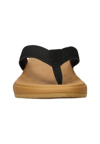 Black flip-flop sandals feature a textured strap and a cushioned tan footbed, designed for comfort with a durable rubber sole.