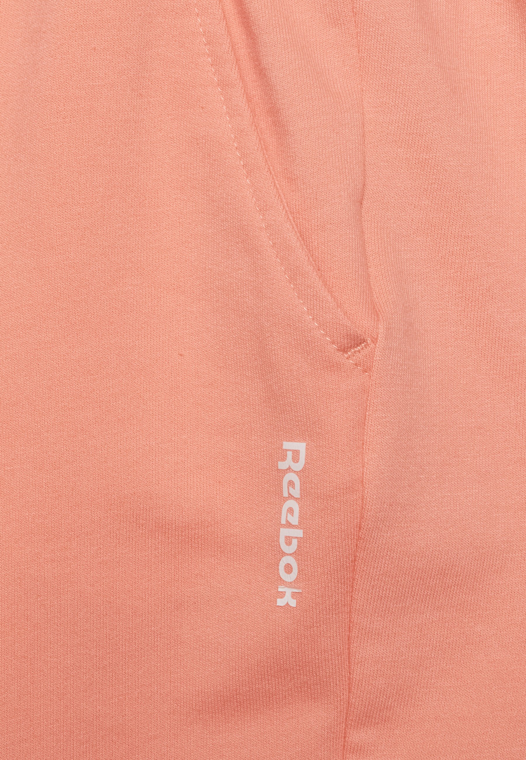 peach reebok classics