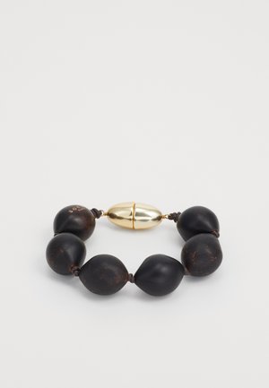 Black bead bracelet featuring irregular shapes, a gold magnetic clasp, and brown accents. Made from a textured material.