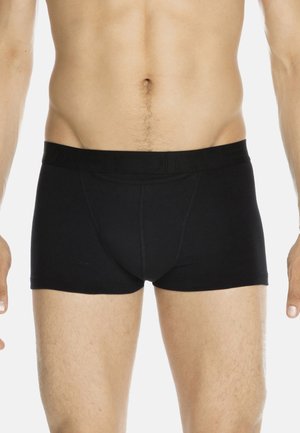 Schwarze Boxershorts für Männer aus glattem Stoff mit einem weichen, elastischen Bund, der den Markennamen trägt, eng anliegendem Schnitt und kurzen Beinen.