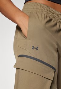 Under Armour UNSTOPPABLE - Püksid - bayou/black