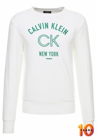Witte sweatshirt met lange mouwen, met groene tekst "CALVIN KLEIN" en daaronder "NEW YORK". Zachte stof en geribbelde zoom.