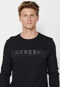 Koroshi Top dugih rukava - black
