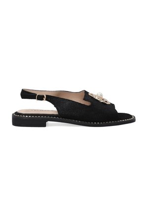Black slingback sandal made of textured material featuring a decorative pearl and gem accent, with a slim black sole and gold stitching.