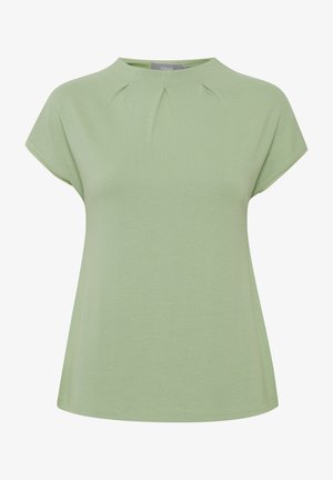 Pale green short-sleeve top with a rounded neckline and subtle pleats at the front; soft, lightweight fabric with a smooth texture.