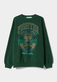 Grön sweatshirts i bomull, med bold grafisk text och mountain-design i guld och turkos. Ribbad mudd och fåll.