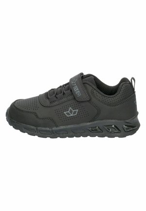Black athletic sneaker with Velcro strap, breathable perforated upper, textured sole, and branded logo on the side and strap.