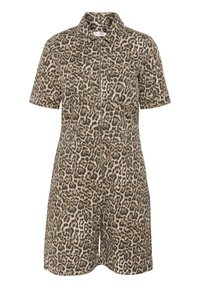 Short-sleeve jumpsuit in a leopard print with shades of tan and brown; features a front zipper and two chest pockets.